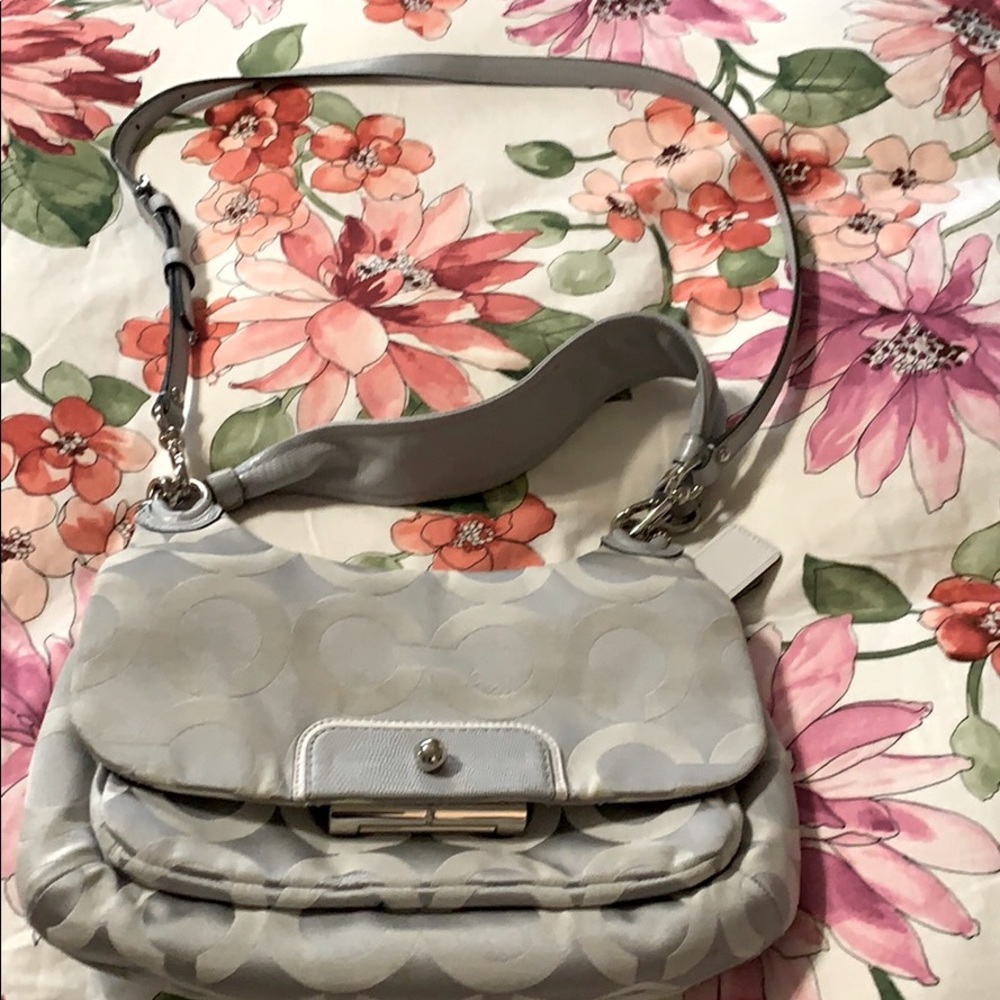 Beautiful silver Coach cross body bag.